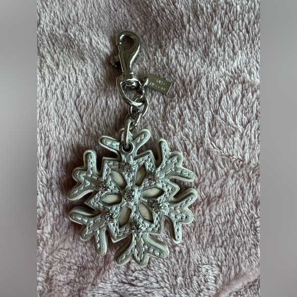 Coach Accessories - Vintage Coach snowflake bag charm